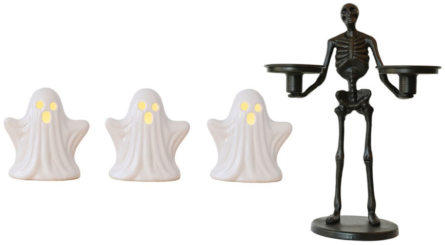 three ceramic ghosts and black and skeleton