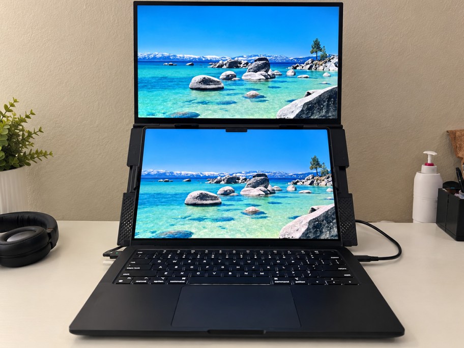 laptop with extra monitor attached on table