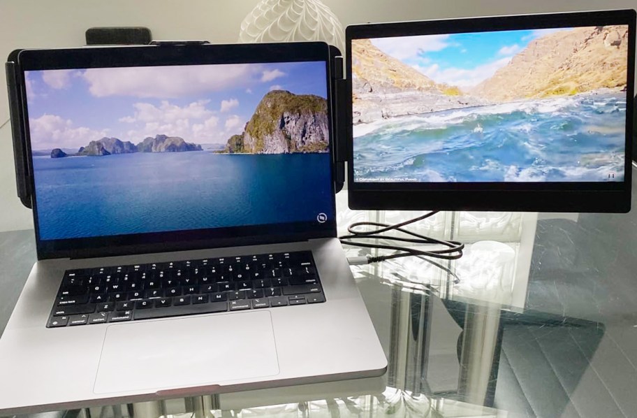 laptop with extended monitor on table