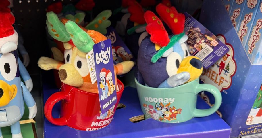 bingo and Bluey Plush in Mugs on shelf in store