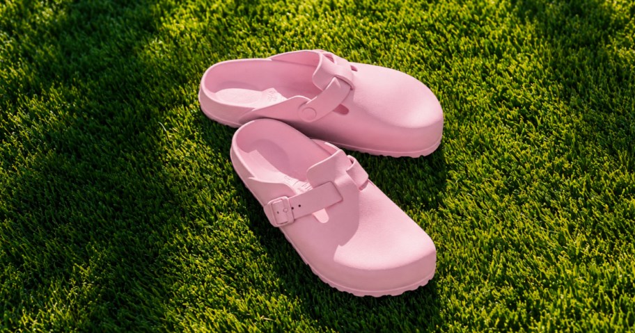 a pair of pink birkenstock clogs