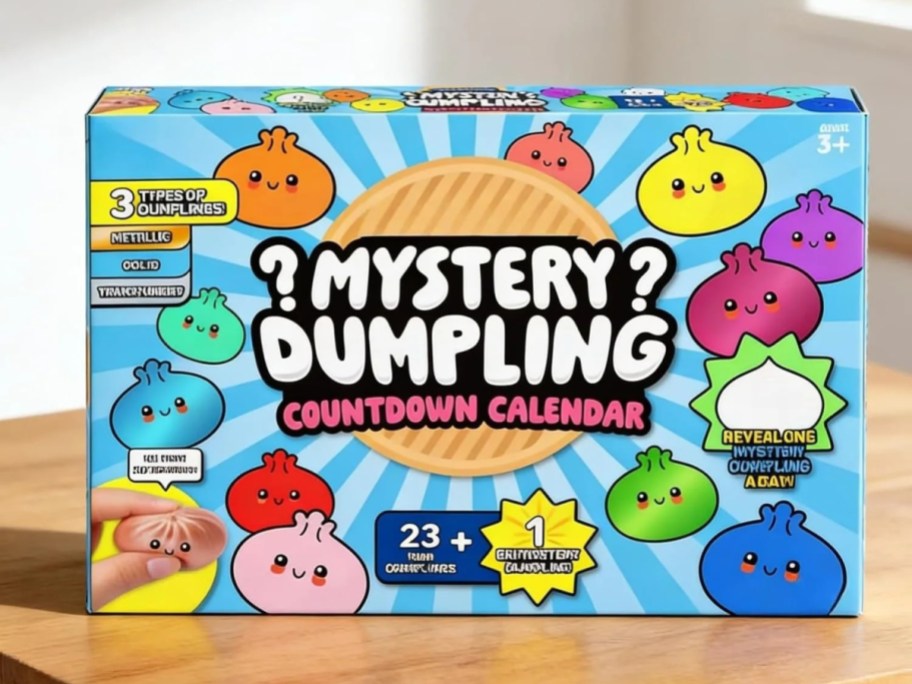A Mystery Dumpling Countdown Calendar box featuring colorful, cute dumpling characters against a blue sunburst background.