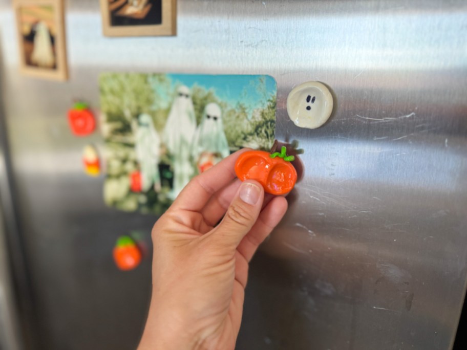 halloween magnets made out of clay on a fridge