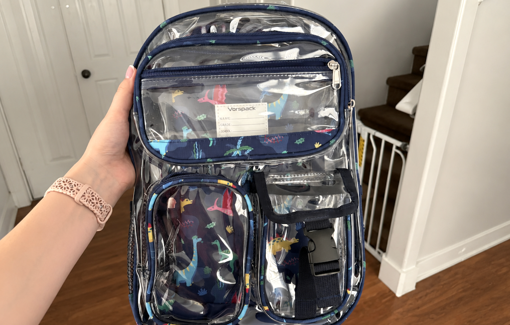 holding clear backpack