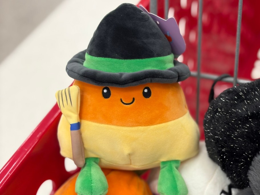 plush candy corn wearing a witch hat