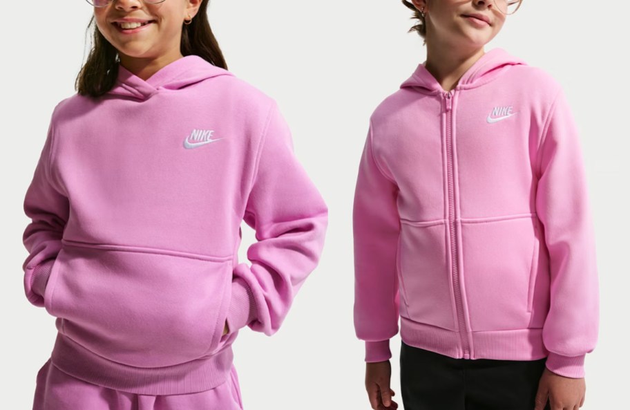 girls wearing pink hoodies
