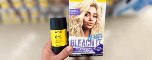 got2b styling wax stick and hair color held in hand
