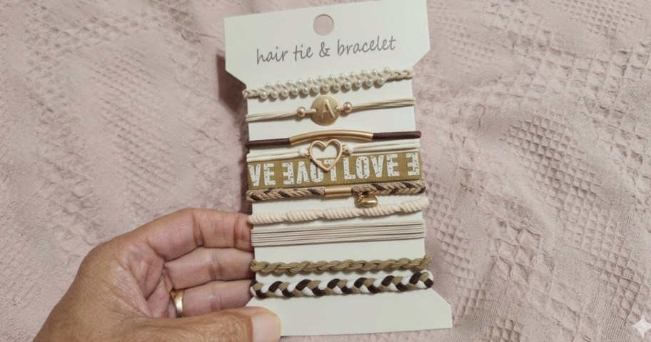 hand holding pack of hair ties