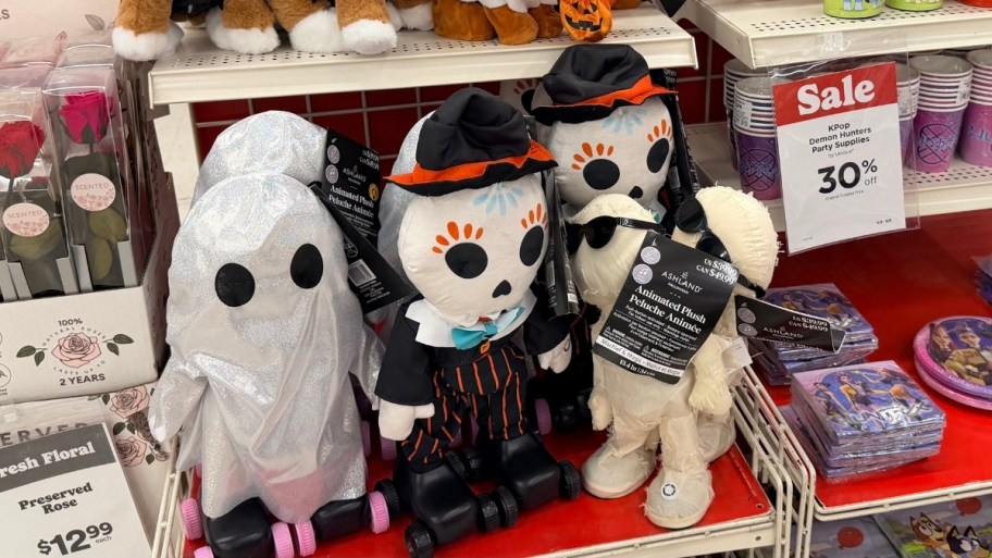 ghost skeleton and mummy animatronics on store shelf
