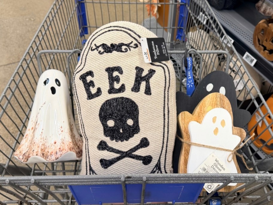 ghost fgure, tombstone pillow and wooden ghost figures