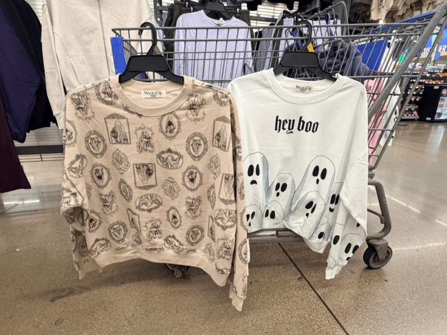 halloween sweatshirts hanging at Walmart