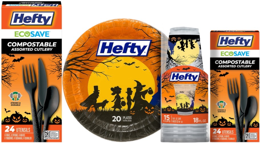 A bundle of Hefty Halloween party supplies including two boxes of compostable assorted cutlery, a pack of paper plates, and a stack of plastic cups featuring spooky trick-or-treat designs.