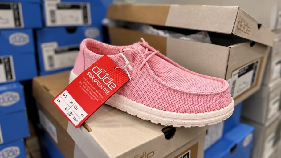 pink heydude shoe on a shoebox at sams club