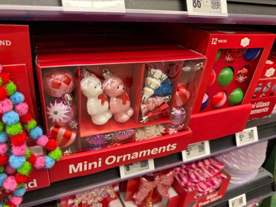 mini ornament sets on a store shelf