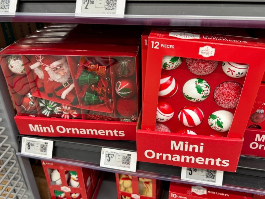 mini ornament sets on a store shelf