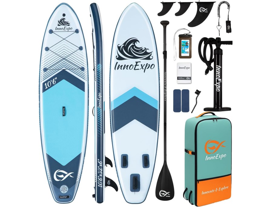 blue and white paddleboard with accessories 