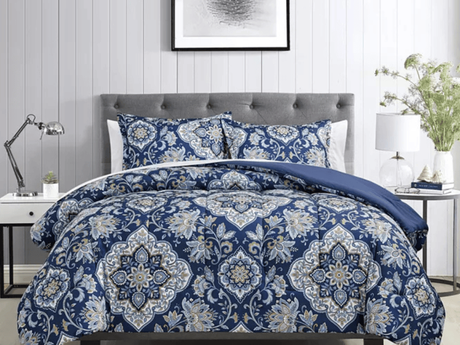 blue comforter set on bed