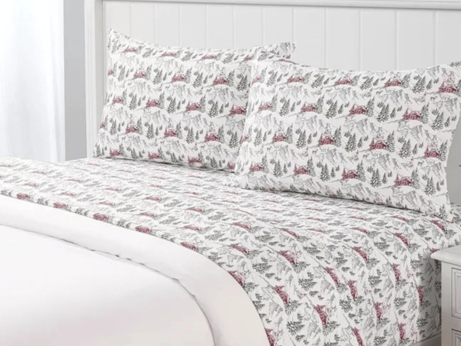 christmas sheets on a bed