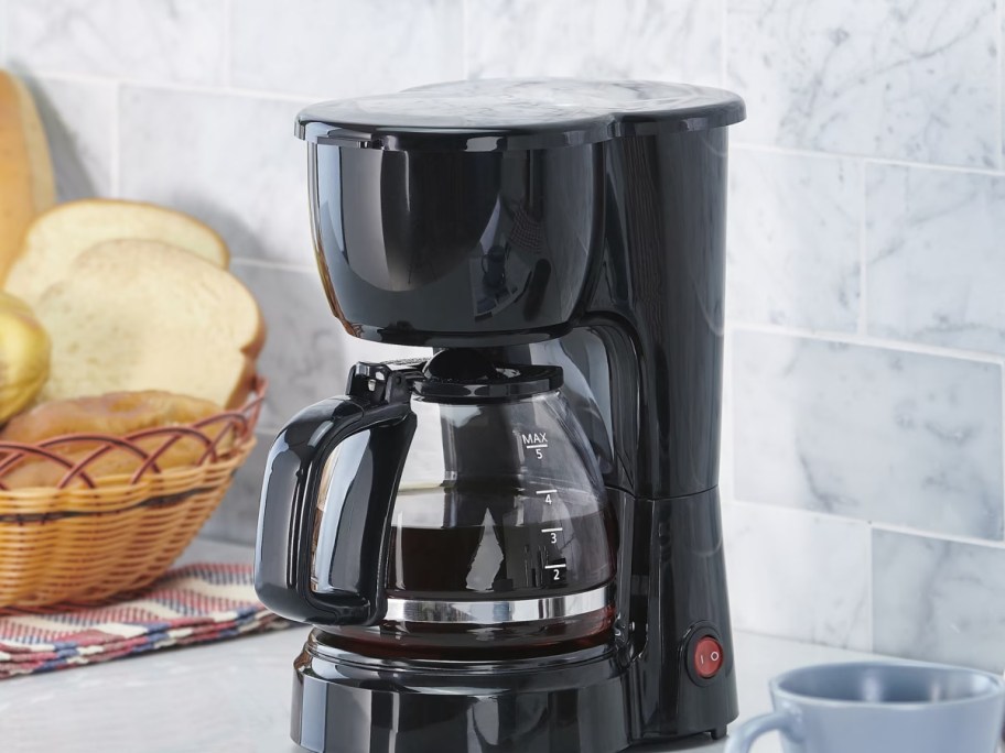 black coffee maker on kitchen counter