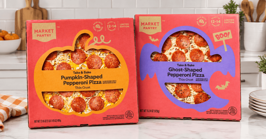 2 halloween pizzas on a kitchen counter