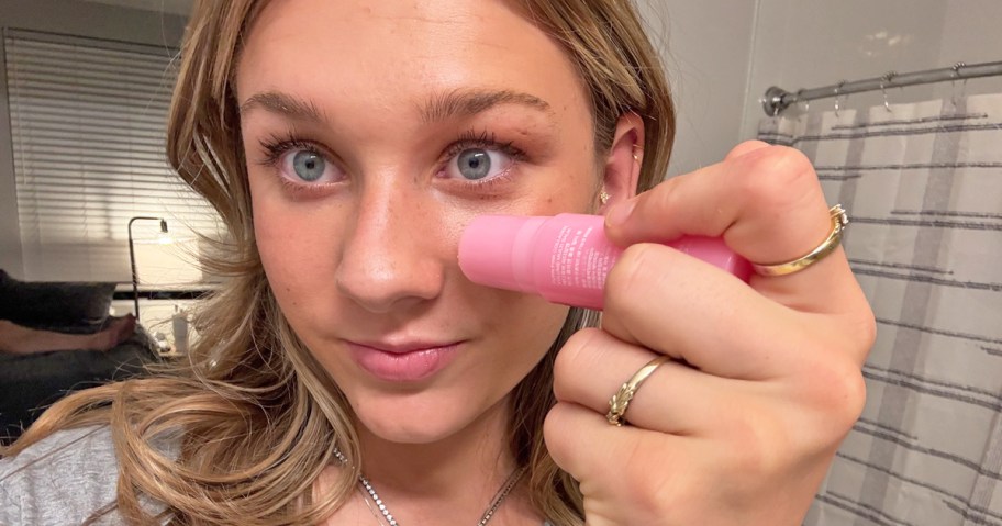 woman applying medicube PDRN Collagen Volume Multi Balm Stick