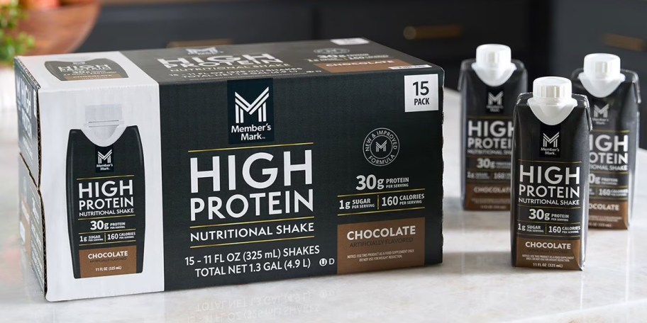 chocolate protein shakes on table with box 