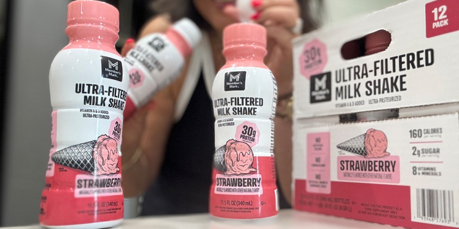 strawberry shakes and box on table 