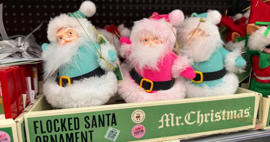 retro Santa ornaments on a store shelf