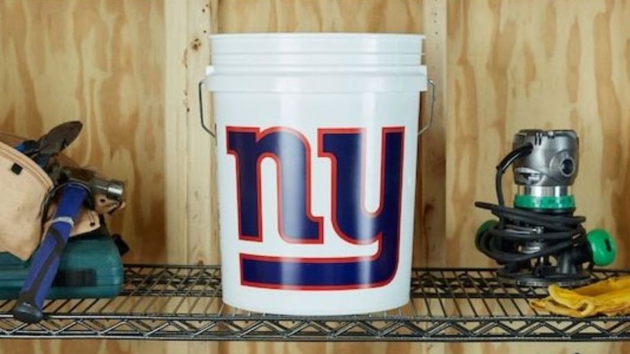 ny giants bucket displayed on top of a shelf 