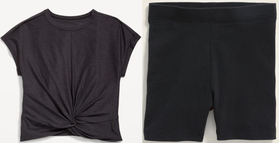 A dark gray short-sleeve top with a front twist knot and a pair of black bike shorts.