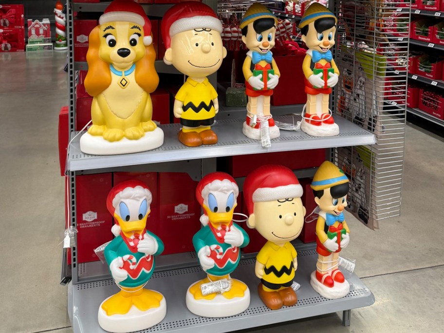 lady, peanuts, and donald duck blow molds 