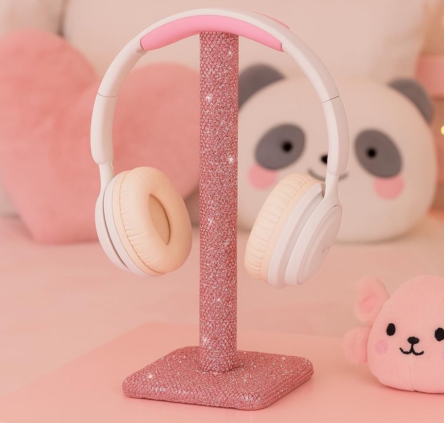 pink headphone stand on pink desk in kids room