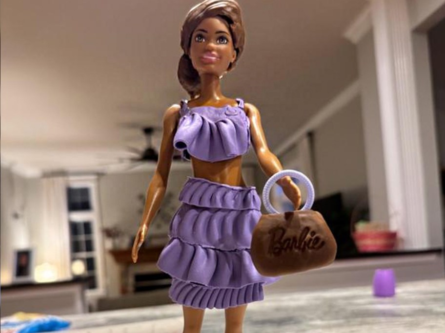 barbie wearing purple playdoh outfit