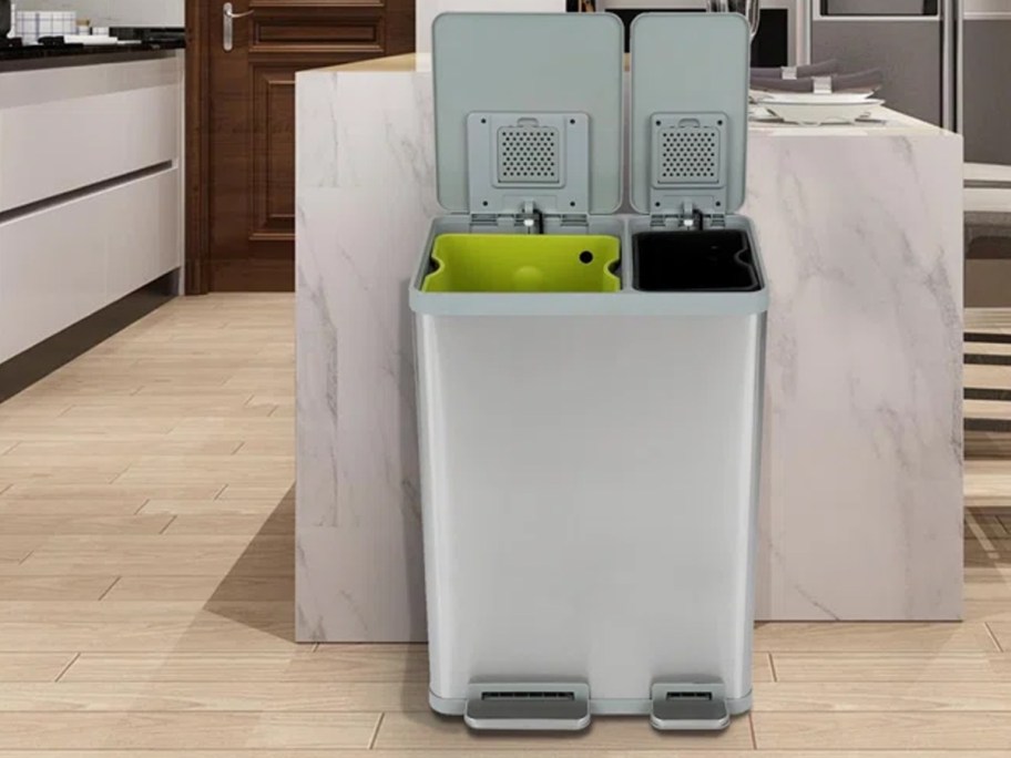 silver trash can open in kitchen 