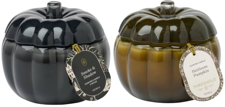two medium pumpkin candles