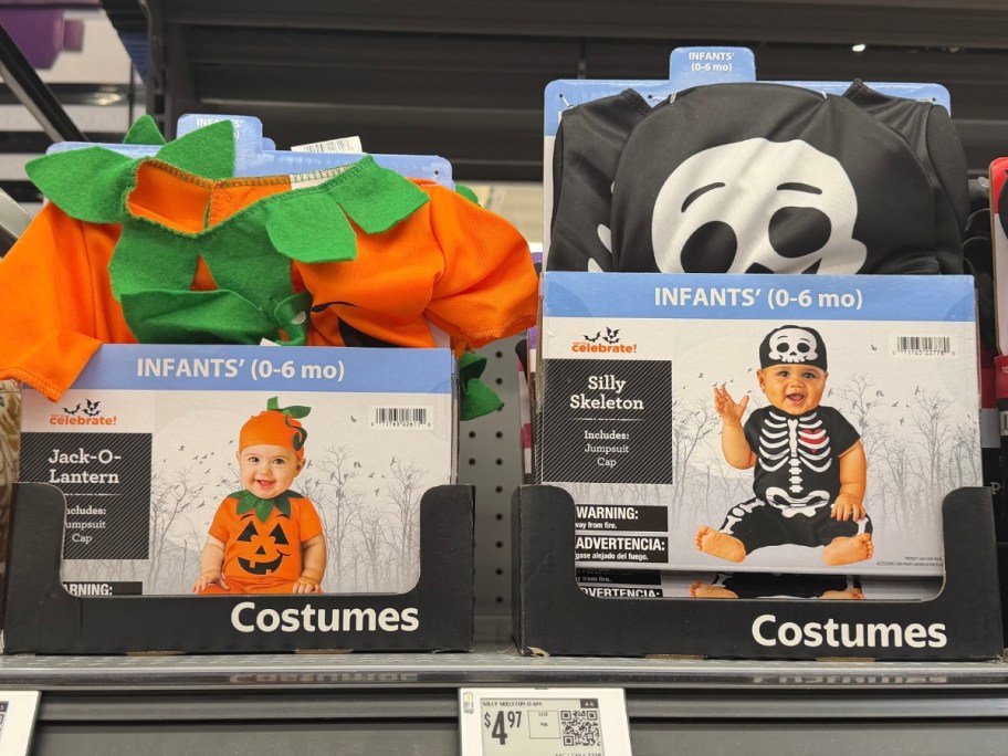 Halloween costumes for babies on a store shelf