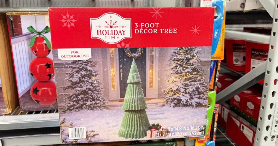 box with green honeycomb christmas tree decor inside Walmart