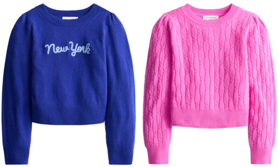 two children's sweaters on a white background