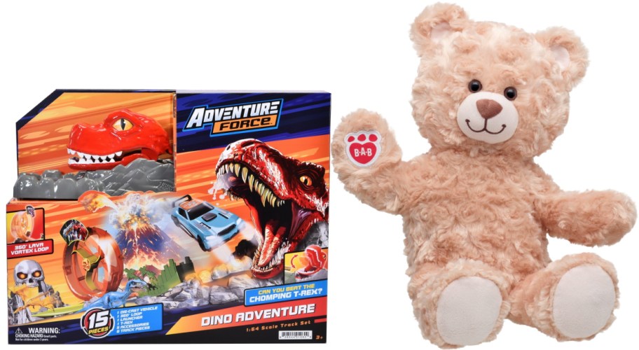 An Adventure Force Dino Adventure 1:64 scale track set box on the left, and a fluffy light brown Build-A-Bear plush bear sitting on the right.