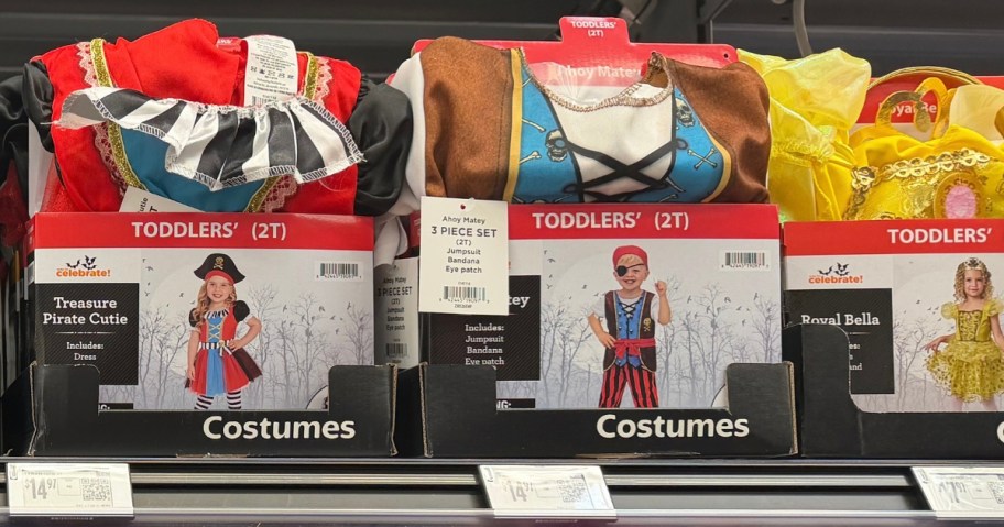 toddler halloween costumes on a store shelf