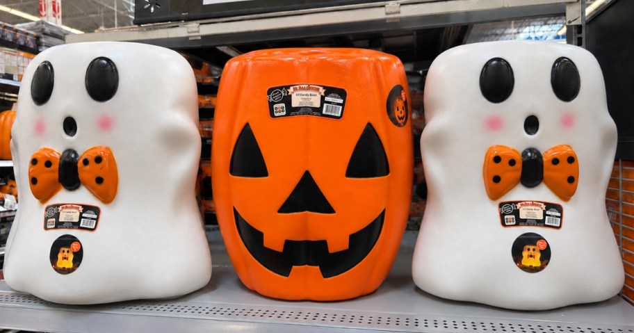 ghost and jack-o-lantern candy bowl blow molds on a store shelf