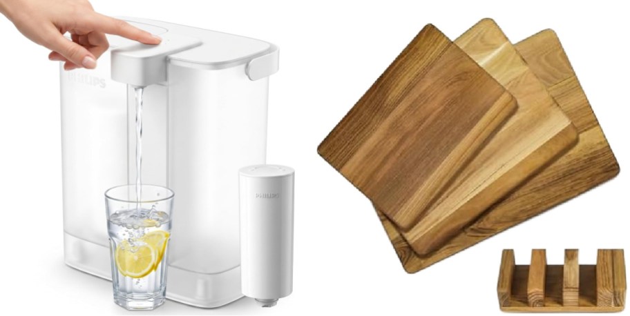 A white Philips water dispenser filling a glass of water with lemon slices on the left, alongside a set of three wooden cutting boards and a matching wooden storage rack on the right.