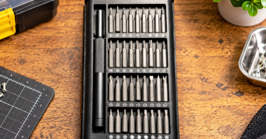 Mini Precision Screwdriver Set on a wood table