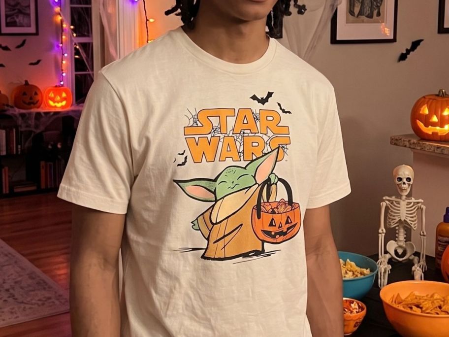 man wearing Adult Star Wars Grogu Halloween Graphic Tee at party