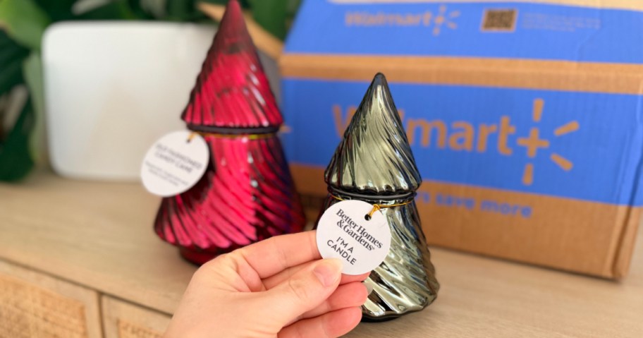 Better Homes & Gardens Christmas Tree Candles in red and silver glass with a Walmart box in the background