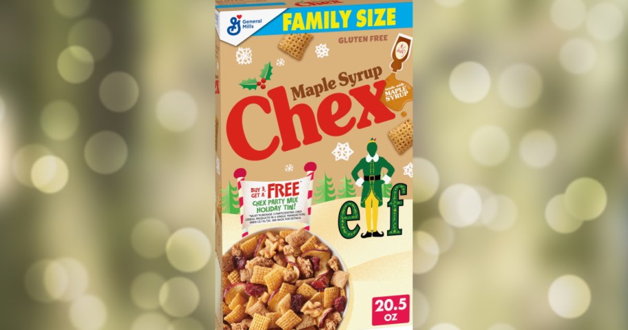 A family size box of Buddy the Elf Maple Syrup Chex cereal featuring holiday designs, a bowl of cereal on the cover, and a promotional offer for a free holiday tin.