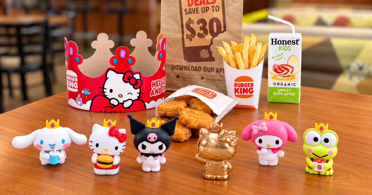 Hello Kitty figures on restaurant table in front of kids meal