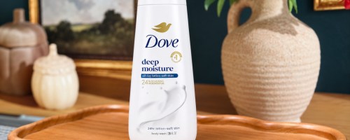 Dove body wash on wooden tray