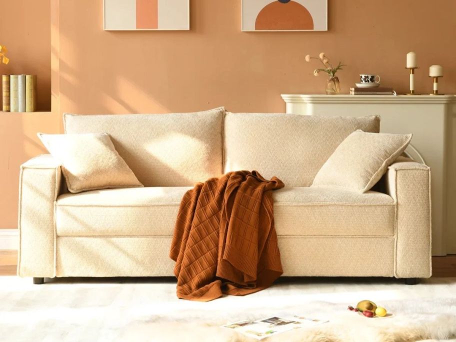 Ebern Designs Upholstered Sofa in living room
