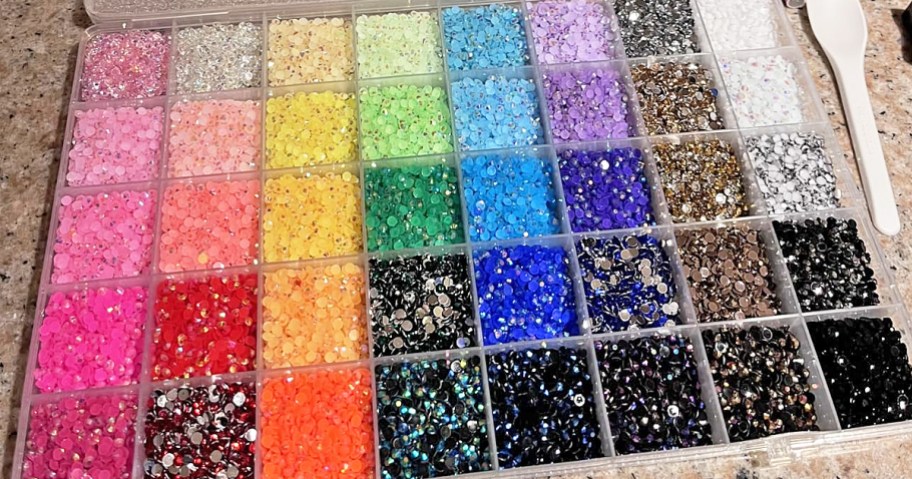colorful rhinestones in plastic organizer